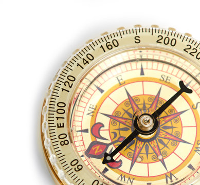 old styled, gold compass isolated on white background