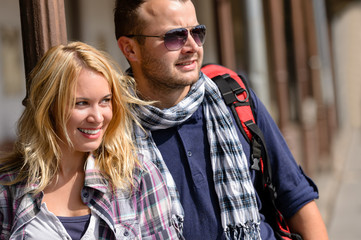 Fototapeta premium Couple traveling by backpack smiling together trip