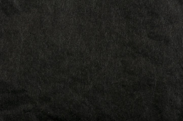 Crumpled black paper