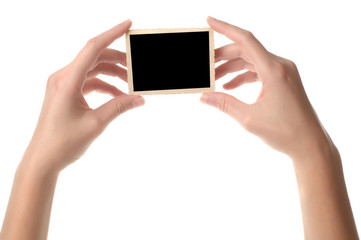 Woman hands holding old photo