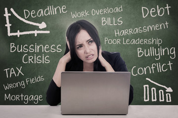 Teacher stress with laptop