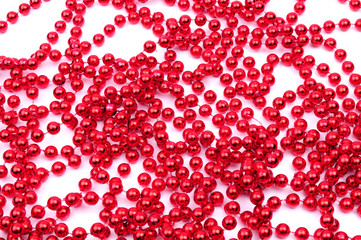 Red beads, Christmas decoration, isolated on white background