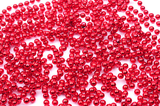 Red beads, Christmas decoration, isolated on white background