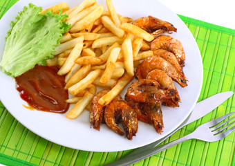 Deep-fried potatoes with fry shrimps. Isolated