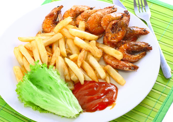 Deep-fried potatoes with fry shrimps. Isolated