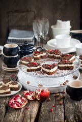 Chocolate Biscuit Cake Decorated with Pomegranate on Festive Tab