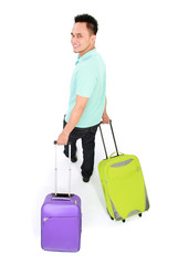 man traveling with two suitcase