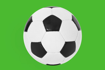 Fu&szlig;ball auf gr&uuml;nem Grund