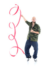 Rapper in camouflage jacket with ribbon stands on tiptoes