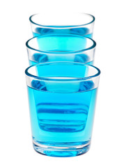 shot glasses with blue liquid