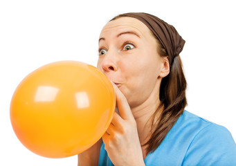 blowing the balloon