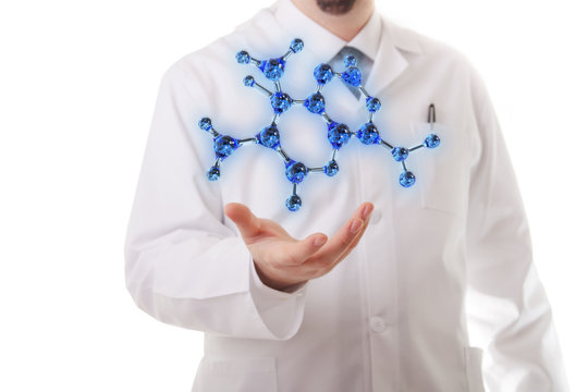 Male scientist showing a molecule