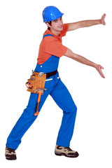 Tradesman pushing an invisible wall