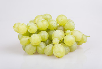 Fresh green grapes. Isolated on white