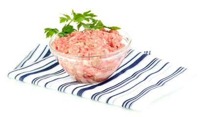 Bowl of raw ground meat isolated on white