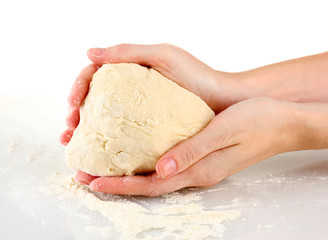 Preparing pizza dough isolated on white