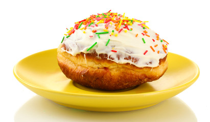 Tasty donut on color plate isolated on white