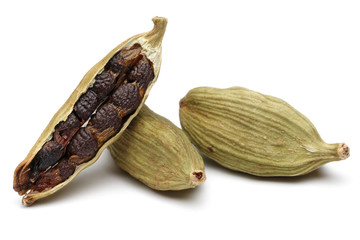 Cardamom seeds on a white background