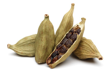 Cardamom seeds on a white background - 47658970
