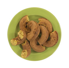 Pumpkin donut pieces on plate