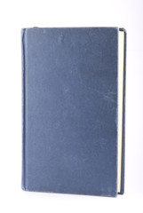 Old blue book isolated on white