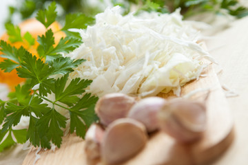 sliced ​​cabbage and garlic in the foreground