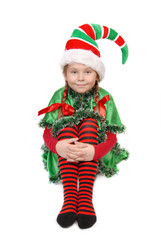 Girl in suit of Christmas elf