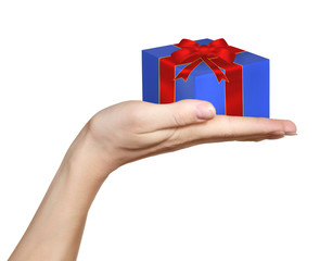 Woman hand holding blue gift box with red bow isolated on white