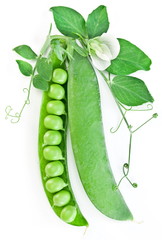 Pods of green peas with leaves