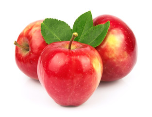 Sweet red apples with leafs