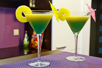 Exotic cocktails in martini glasses