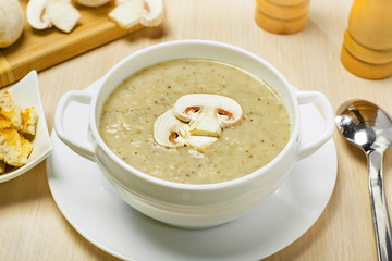 Mushroom cream soup on a table, food