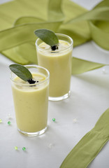 A green vegetable  cream in 2 small verrine/verine glasses