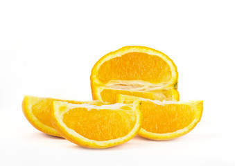 Fototapeta na wymiar Orange fruit with cuts on white background