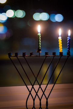 Candles and hanukkah menorah with defocus background