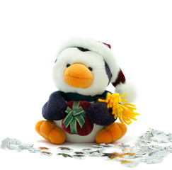 Santa Penguin with present surrounded by silver stars.