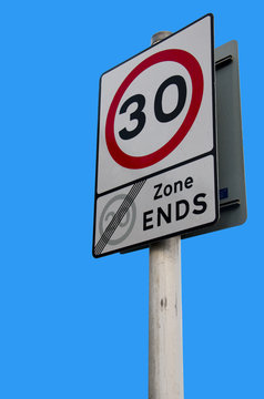 30mph sign on bluw sky background