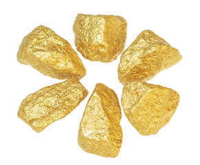 Gold bullion nuggets. On a white background.