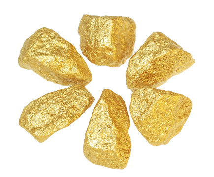 Gold Bullion Nuggets. On A White Background.