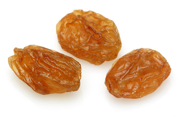 Three Raisin on a white background