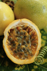 Passion fruits/ Marakuja, whole and halved