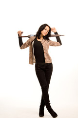 Sexy brunette posing with a closed umbrella