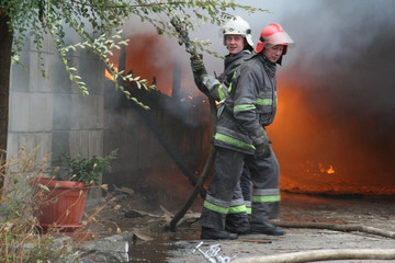  Fire department in action during burning warehouses