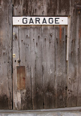 Wooden door with sign 