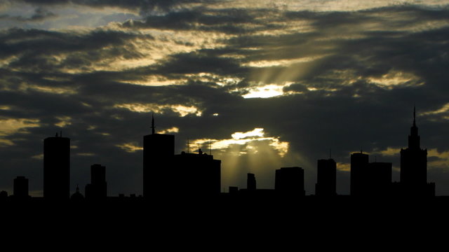 Poland Warsaw skyline sunbeams