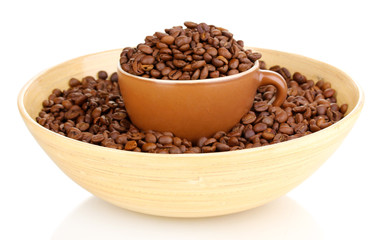 Coffee beans in bamboo bowl with cup isolated on white