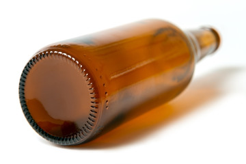 Brown beer bottle on a white background