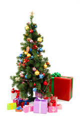 Decorated Christmas tree with gifts isolated on white
