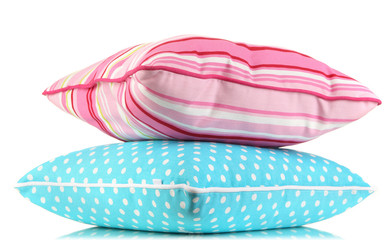 Blue and pink bright pillows isolated on white