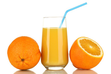 Delicious orange juice in glass and oranges next to it isolated